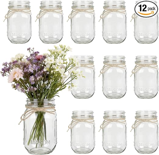 Twelve small clear glass mason jar vases