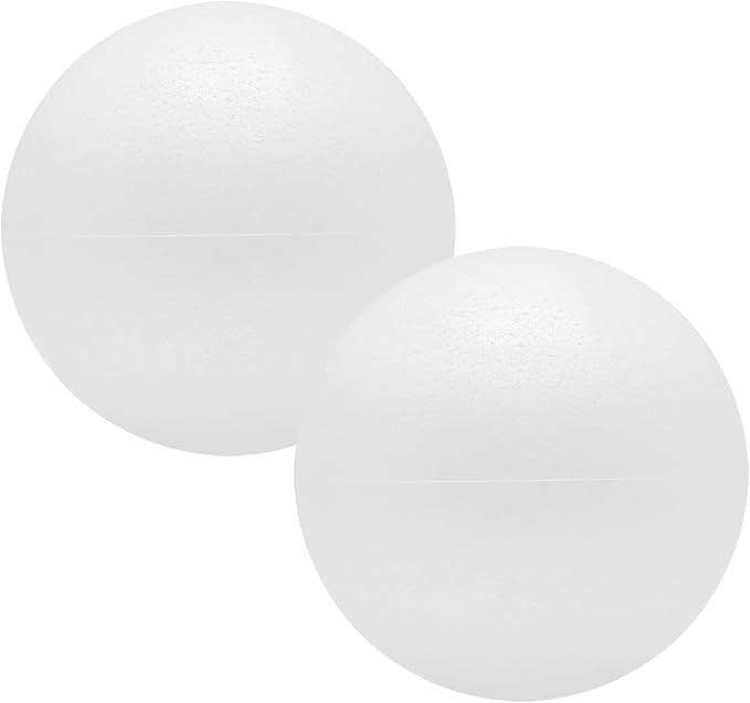 Two large white polystyrene craft balls