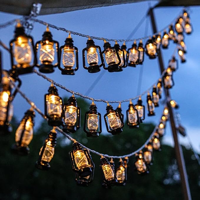 Mini kerosene lantern string lights with warm LED bulbs