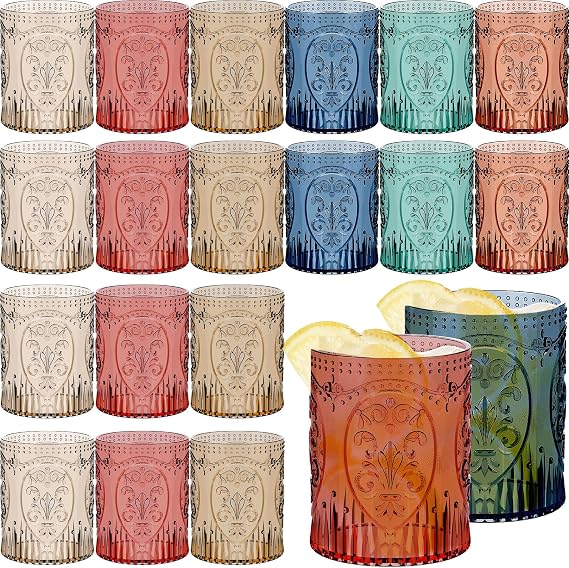Vintage multicolored embossed plastic tumblers in pink, amber, blue and green
